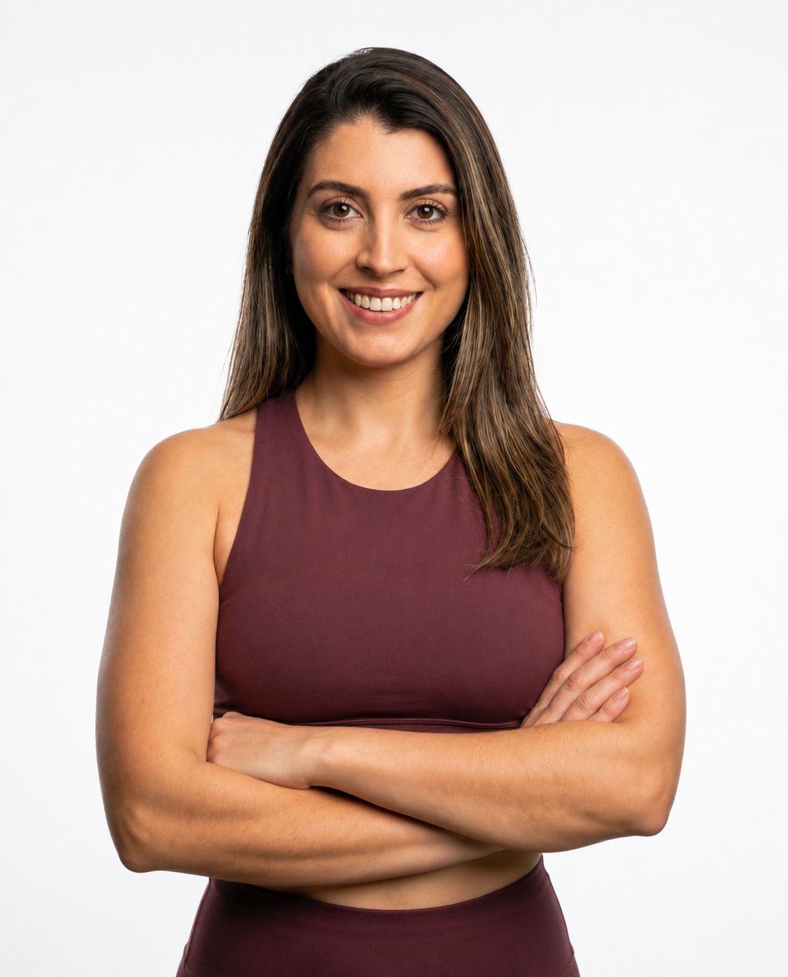 Rafaela Freitas smiling in a professional fitness portrait